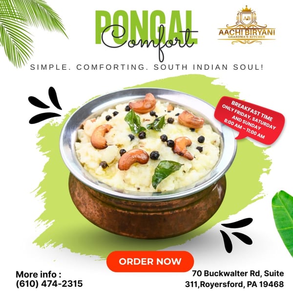 A bowl of Pongal, garnished with cashews, curry leaves, and black peppercorns.